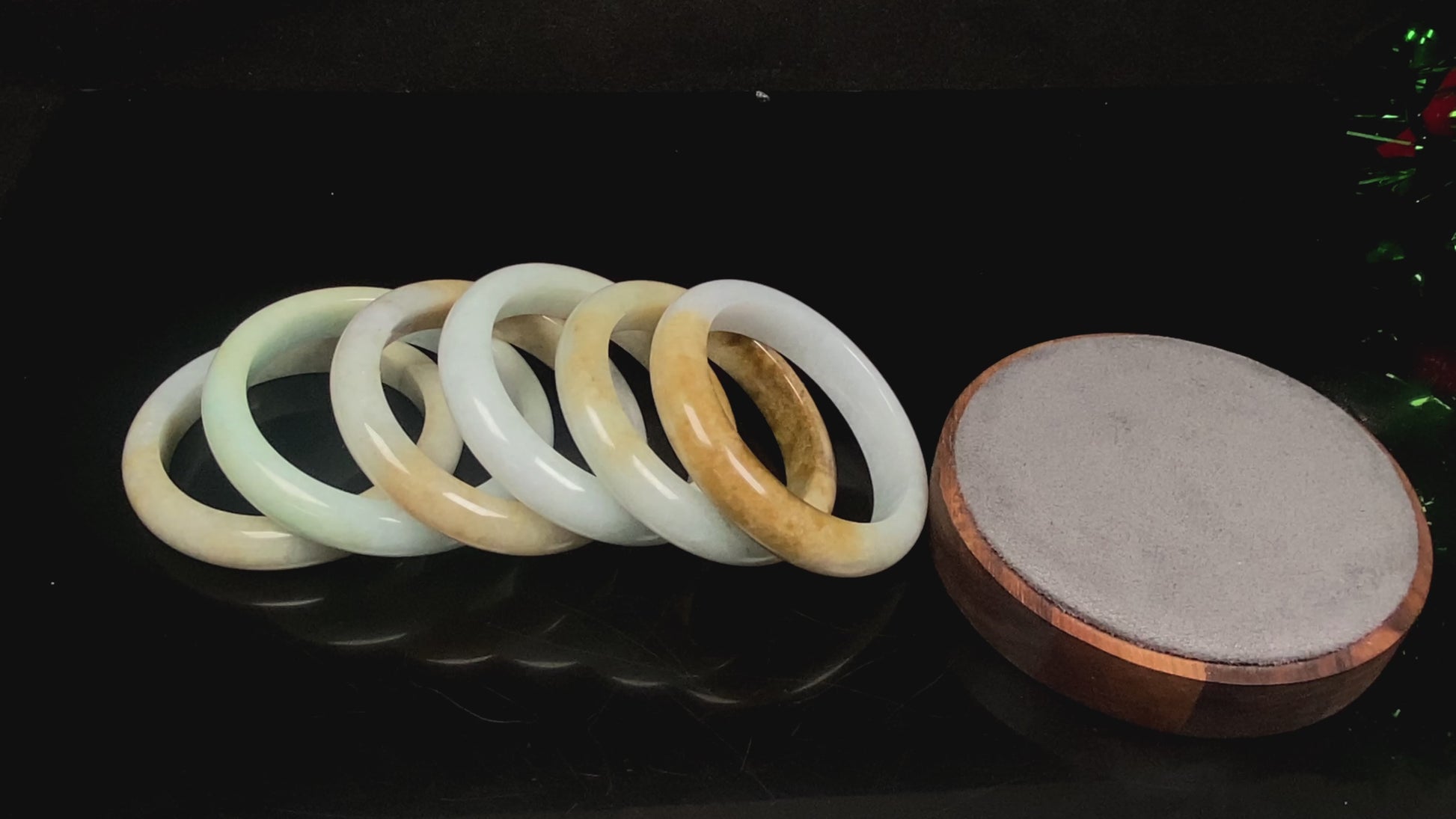 A golden dust sprinkled gently jadeite bangle.