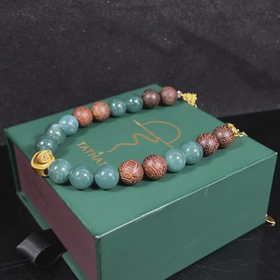 A auspicious golden Ruyi blue bead jadeite brown bead agarwood bracelet.
