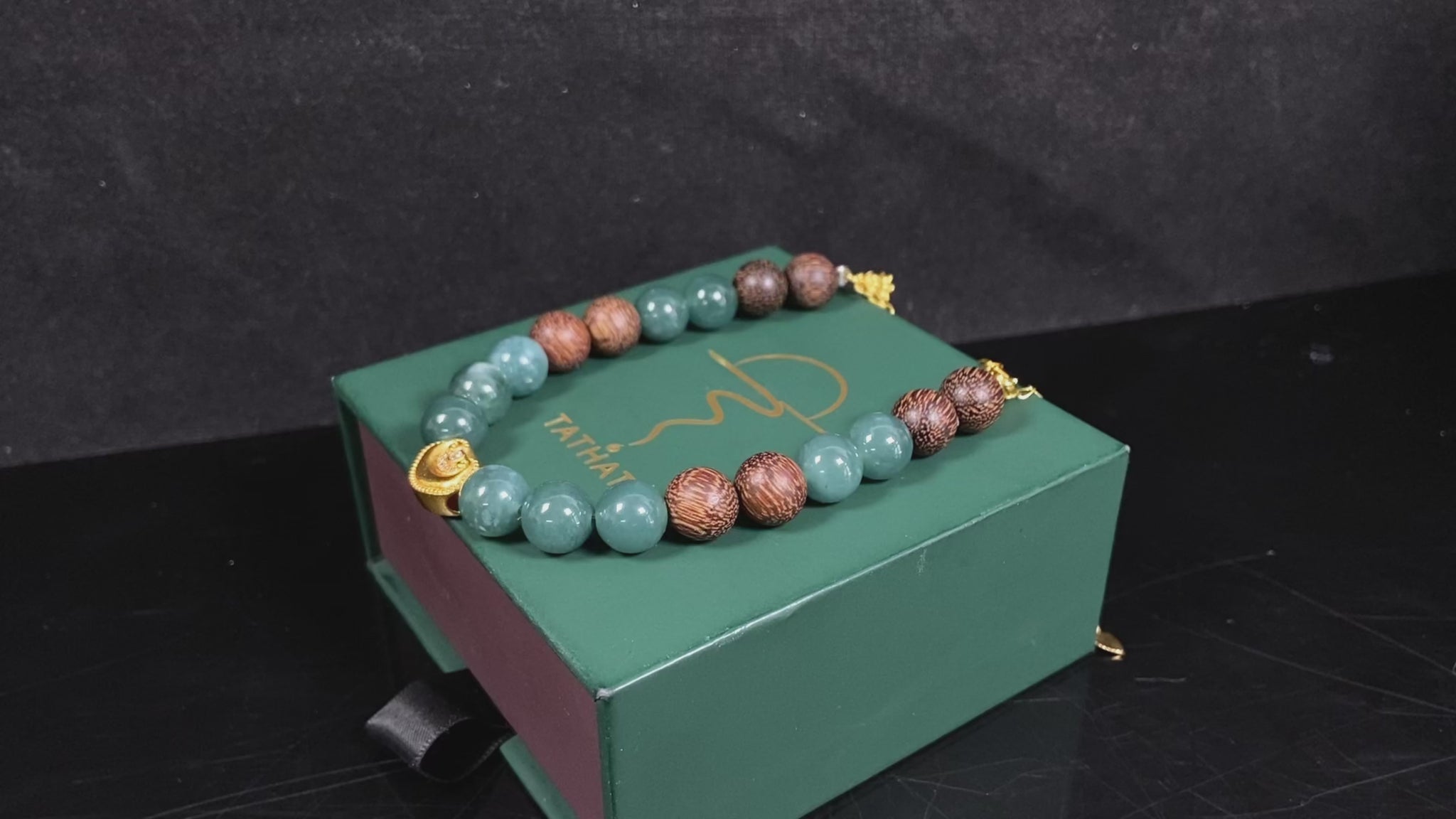 A auspicious golden Ruyi blue bead jadeite brown bead agarwood bracelet.