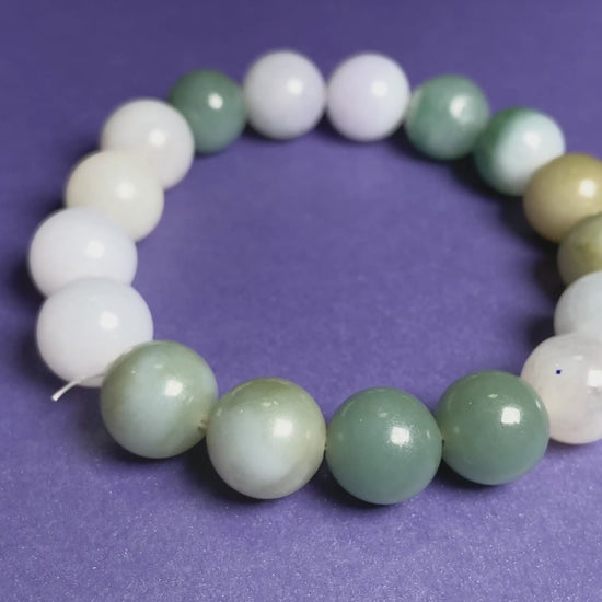 A green mist blended with white jadeite beads bracelet.