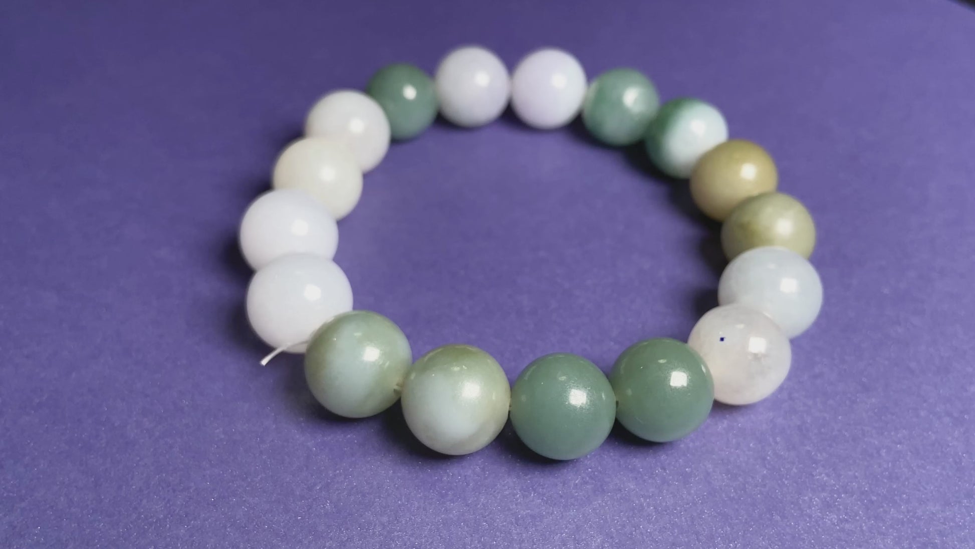 A green mist blended with white jadeite beads bracelet.