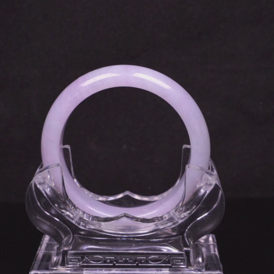 Lavender hues spreading jadeite bangle.