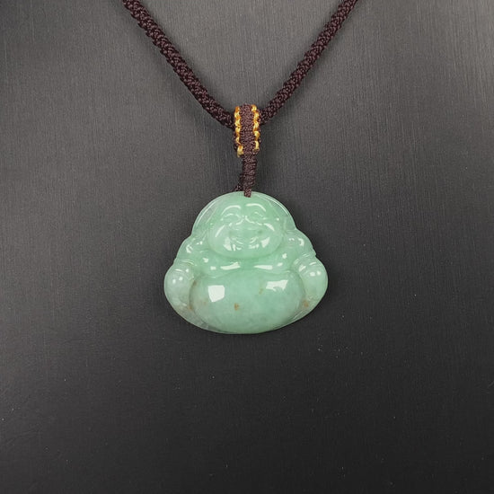 A apple green Maitreya Buddha loose jadeite.