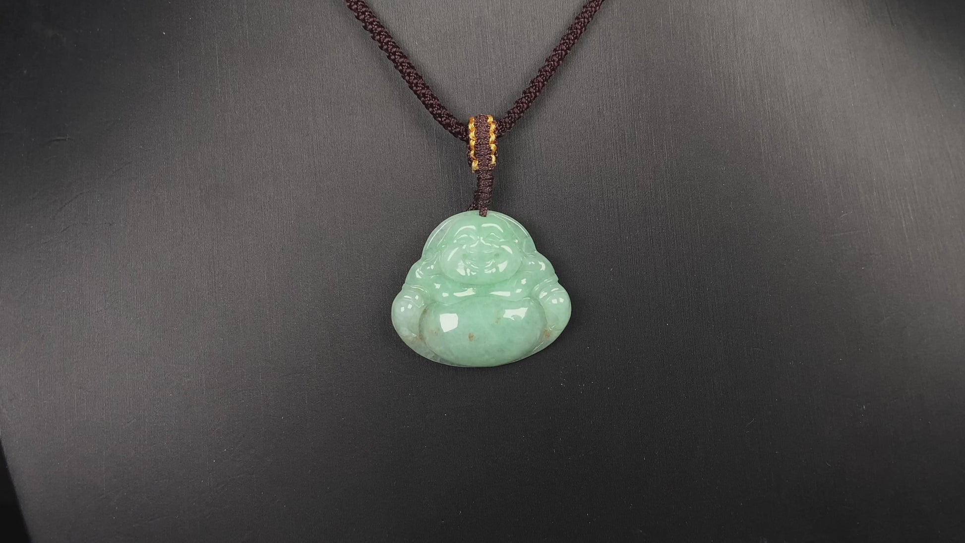 A apple green Maitreya Buddha loose jadeite.