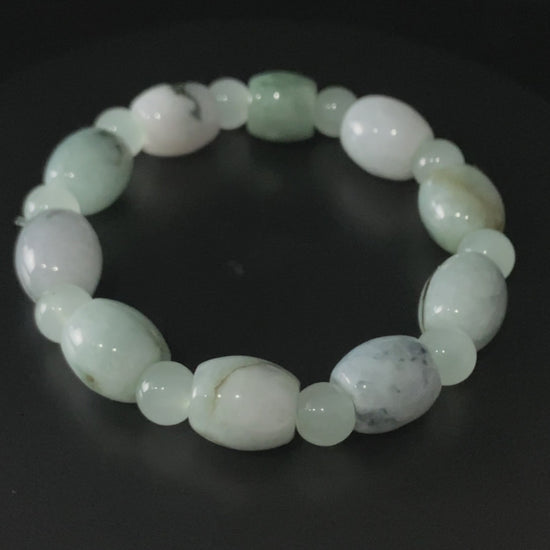 A floating mist barrel jadeite beads bracelet.