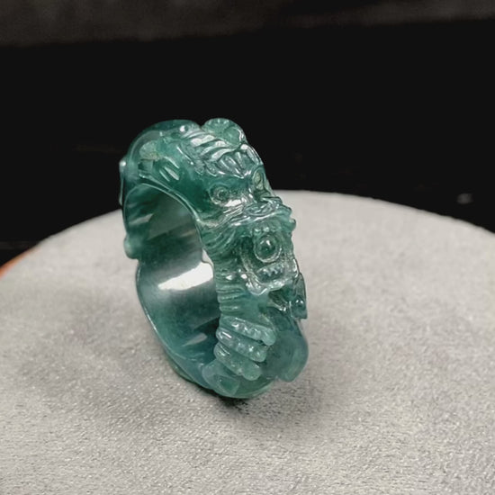 A ocean blue dragon jadeite ring.