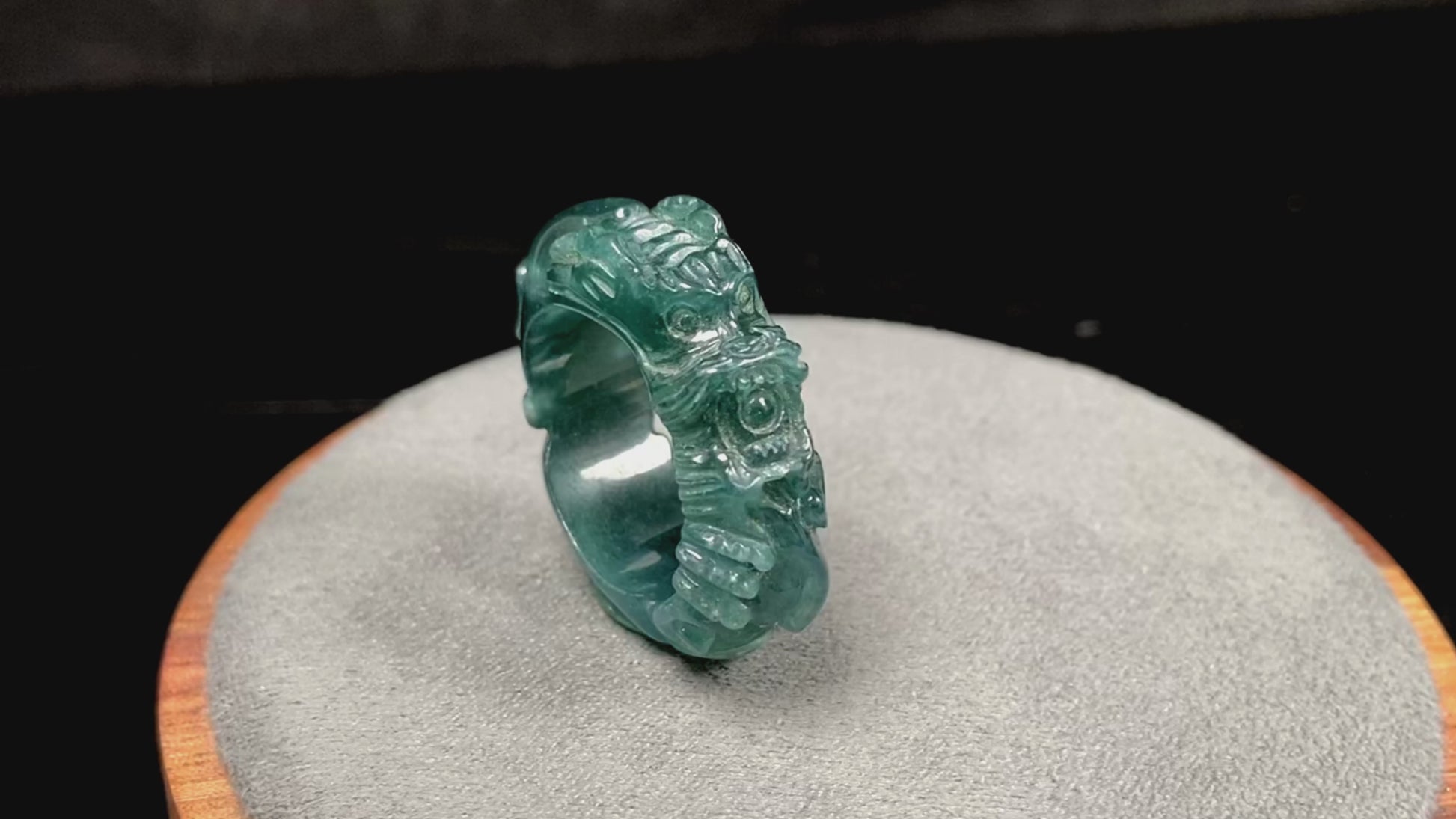 A ocean blue dragon jadeite ring.