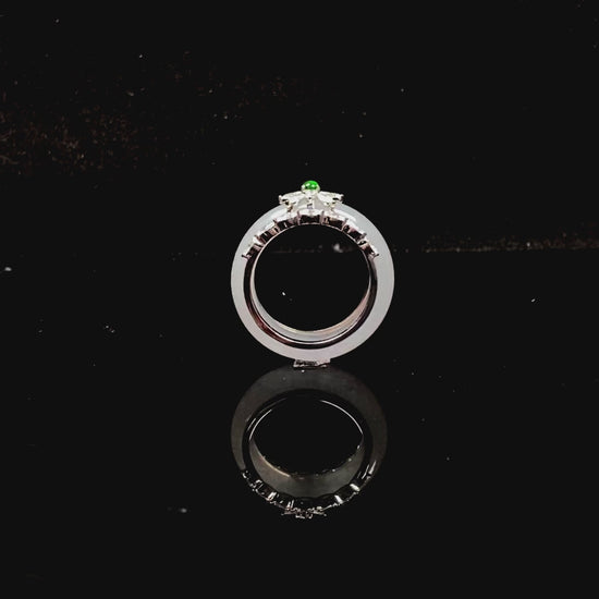 A icy white with green accent jadeite ring.