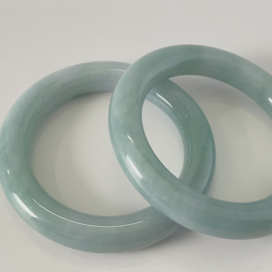 A misty blue dew jadeite bangle.