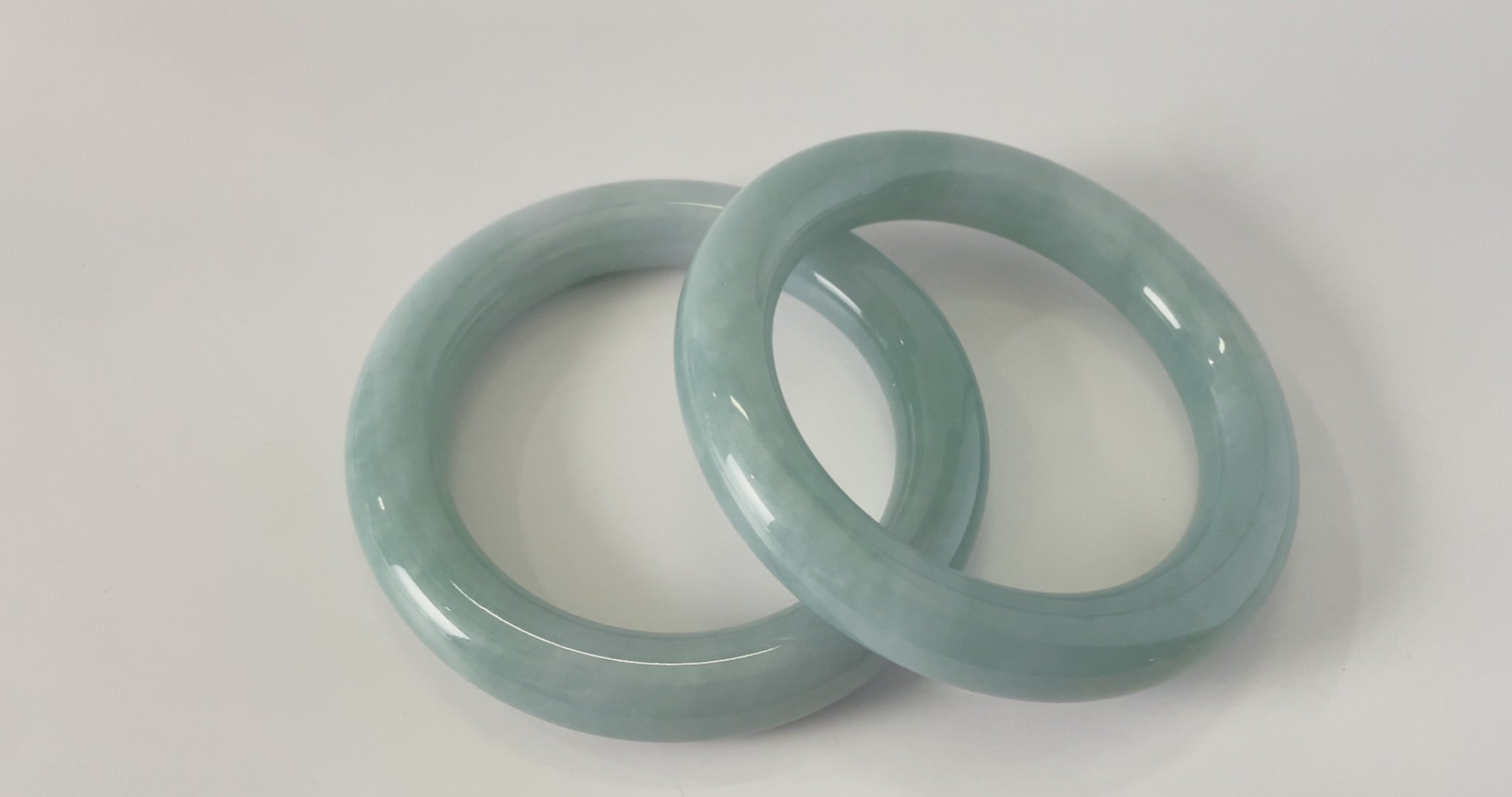 A misty blue dew jadeite bangle.