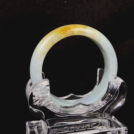 A dawn glow golden hue jadeite Bangle