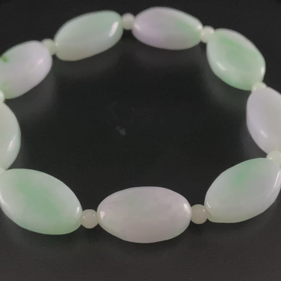 A soft mint cval jadeite beads bracelet.