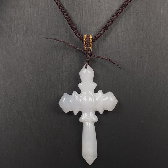A milky white sword cross loose jadeite.