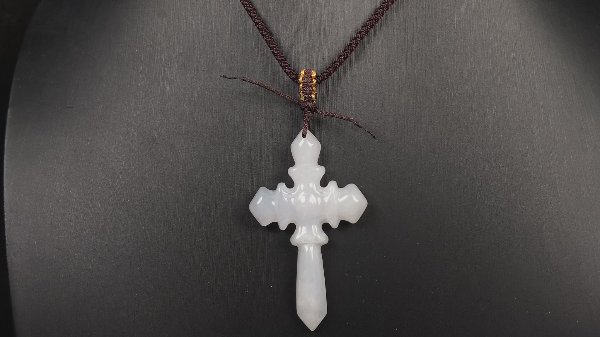 A milky white sword cross loose jadeite.