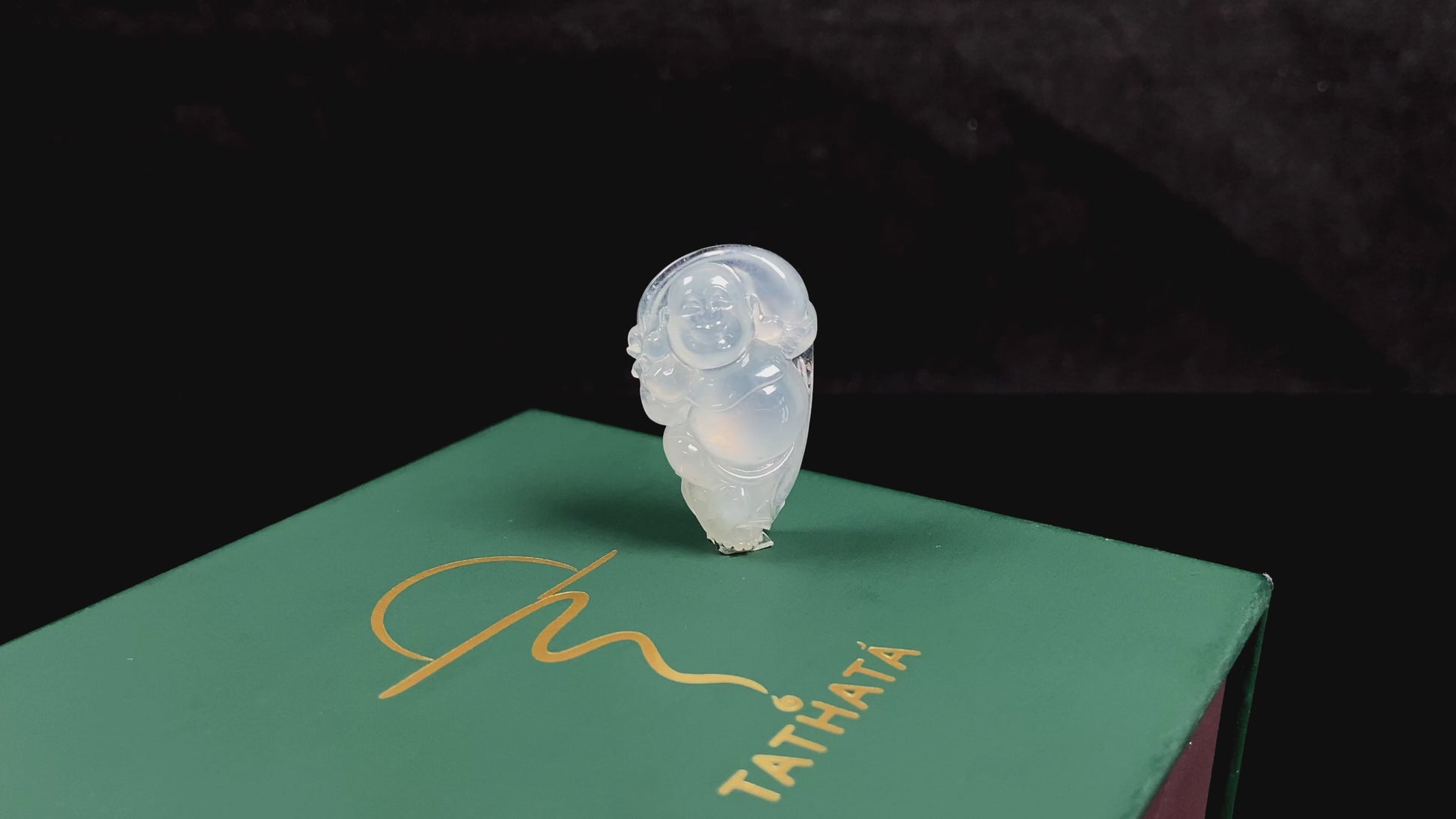 A translucent milky white maitreya buddha loose jadeite.