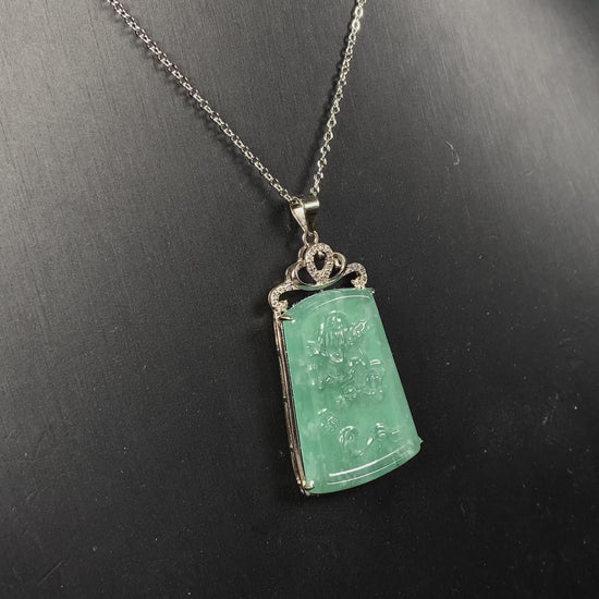 A icy green dragon sparkle jadeite pendant.