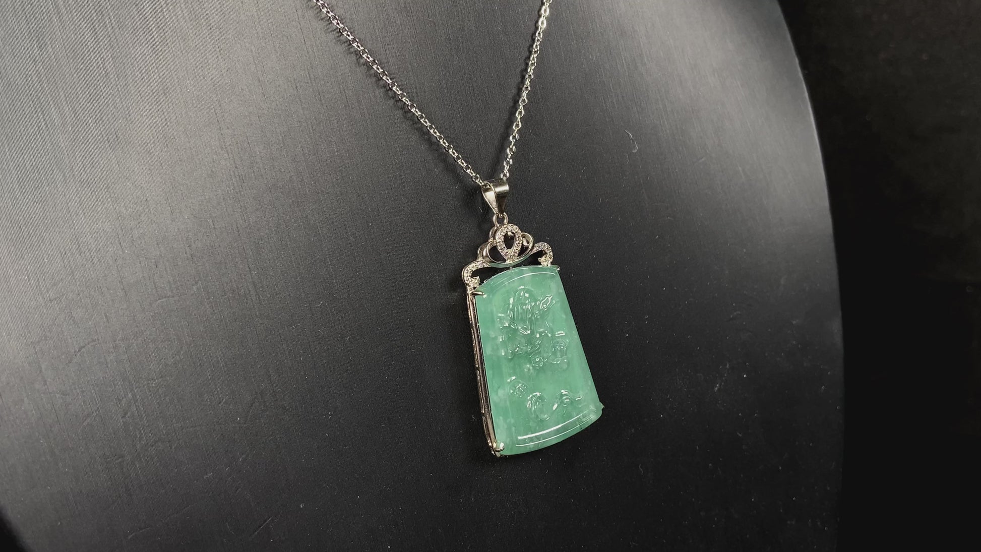 A icy green dragon sparkle jadeite pendant.