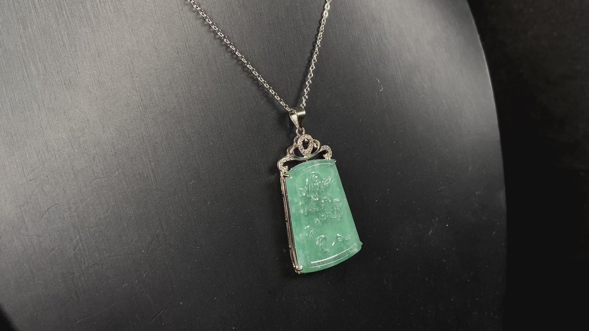 A icy green dragon sparkle jadeite pendant.
