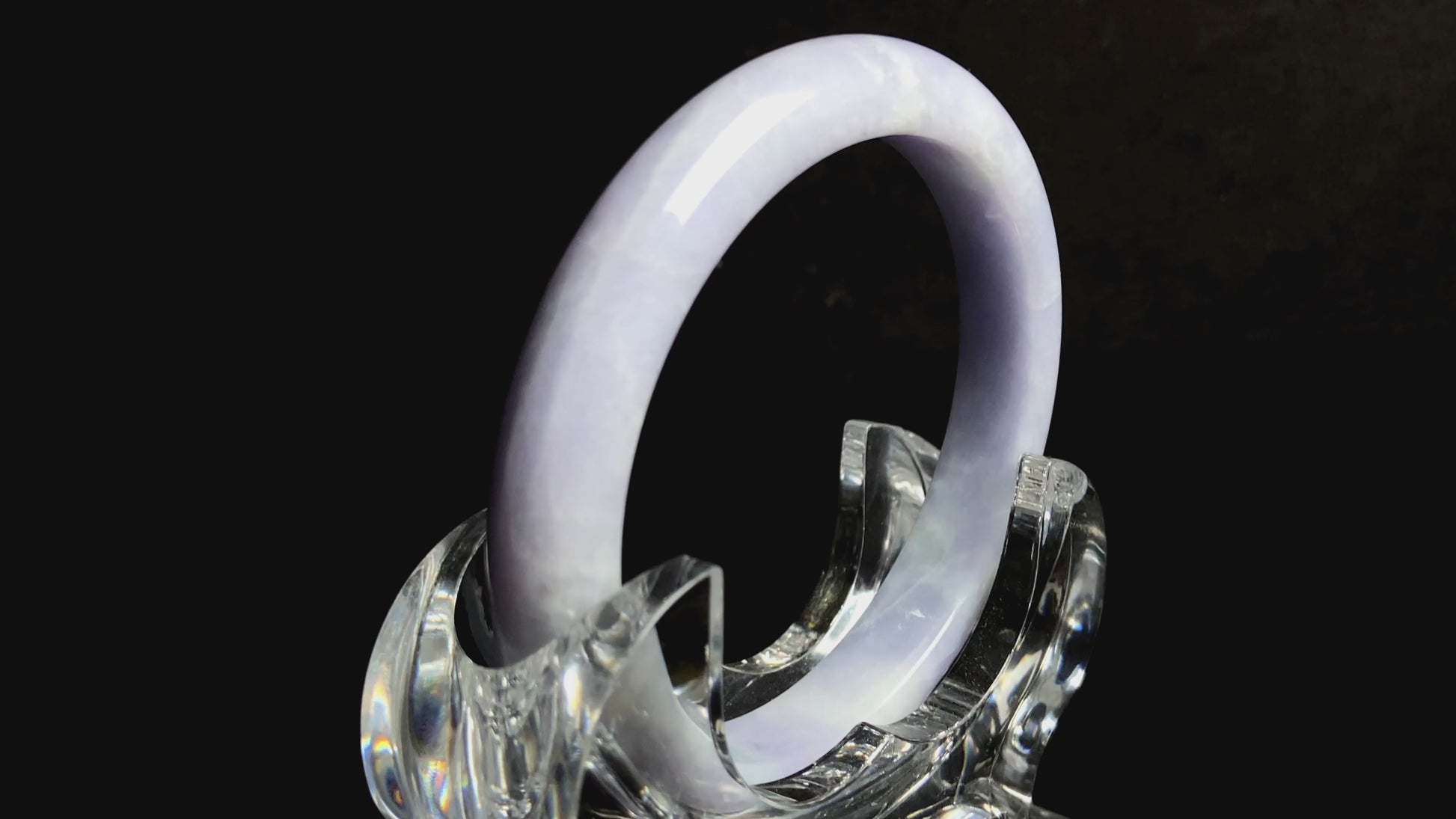 A soft lavender cloud jadeite bangle.