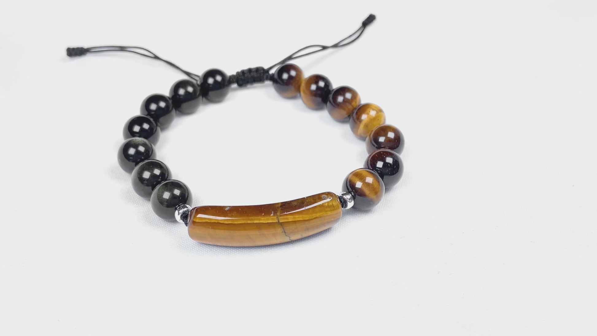A black and gold contrast natural tiger's eye beaded bracelet.