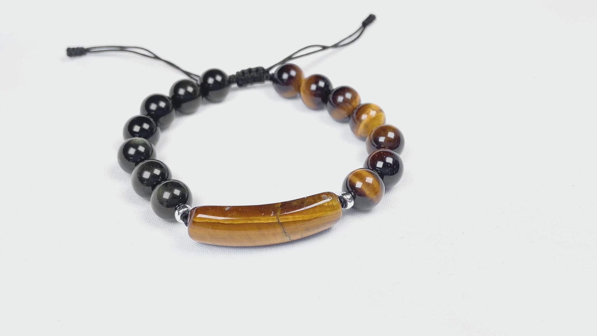A black and gold contrast natural tiger's eye beaded bracelet.