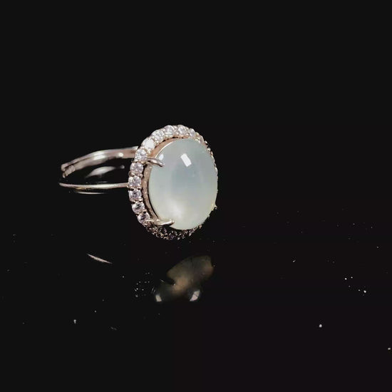 A moonlit frost glimmer jadeite ring.