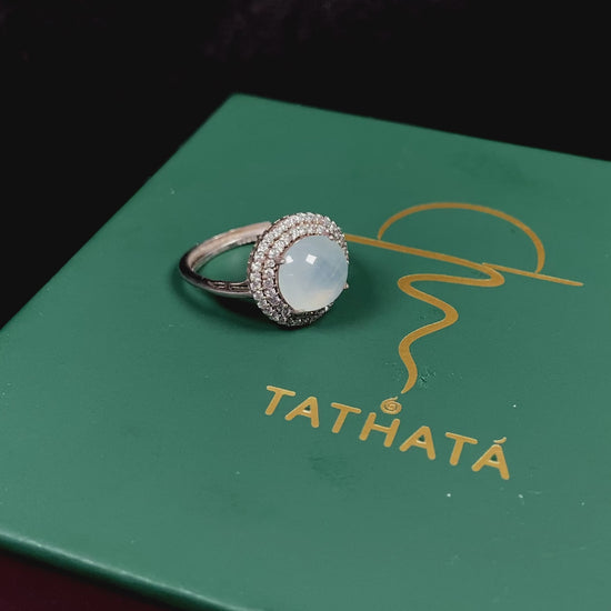 A double halo frost glow jadeite ring.