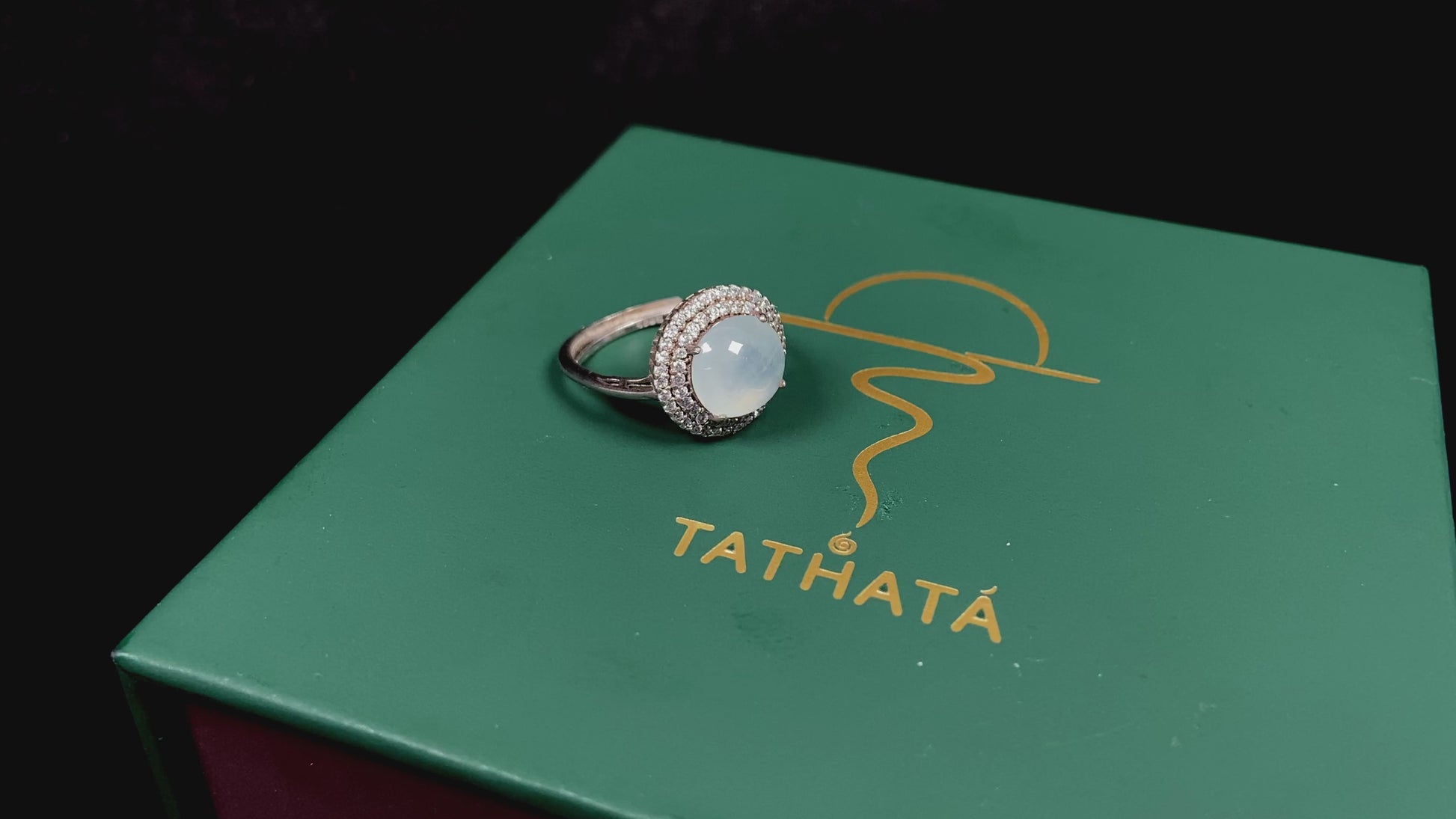 A double halo frost glow jadeite ring.