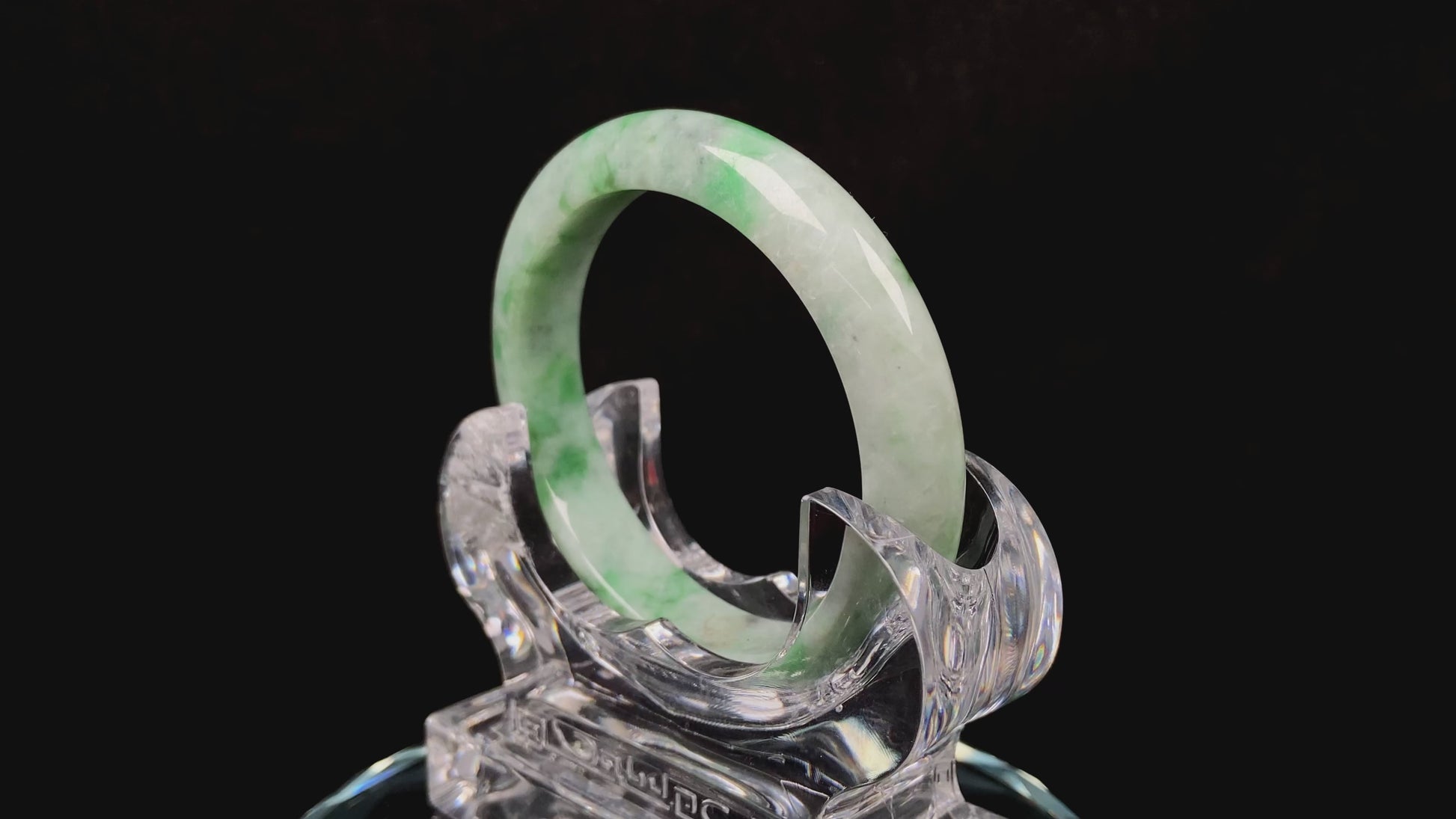 A misty bamboo green jadeite bangle.