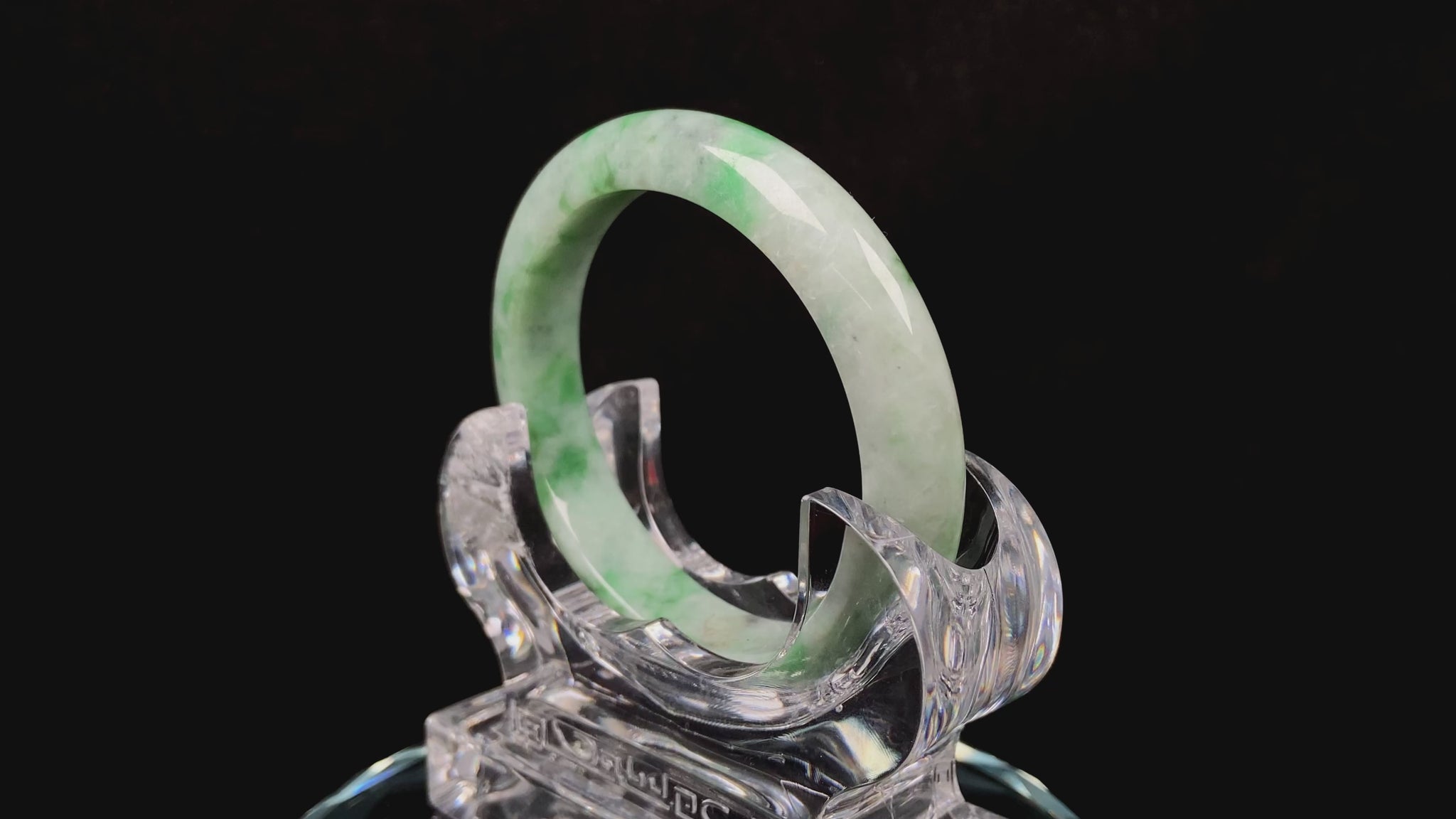 A misty bamboo green jadeite bangle.