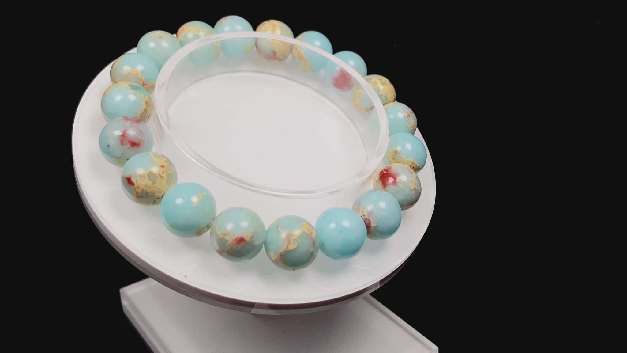A red whispers in blue and white Shoushan stone beaded bracelet.