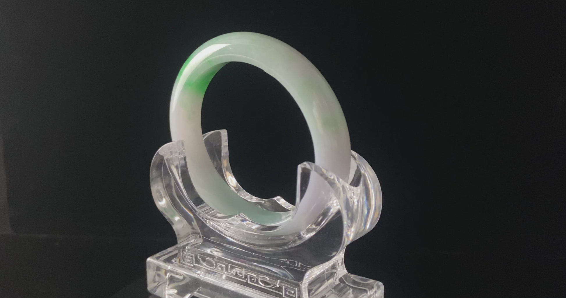 A lavender mint vein jadeite bangle.