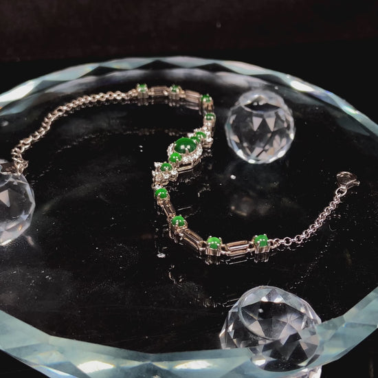 A glacial green dewy jadeite bracelet.