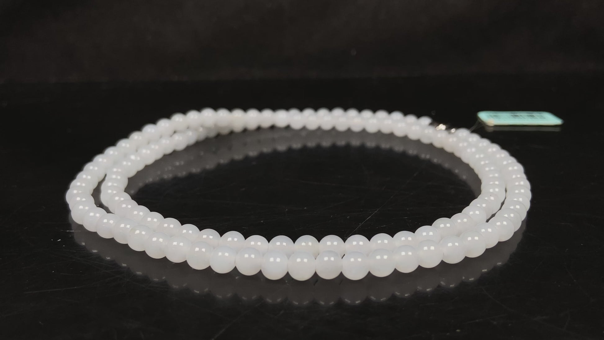 A milky moonbeam jadeite beads necklace.