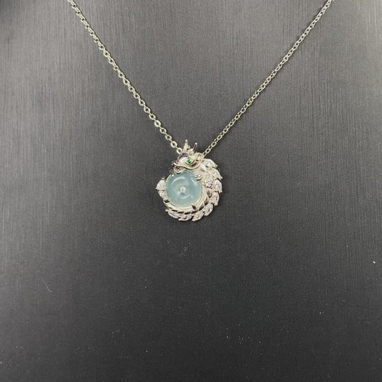 A azure dragon guard jadeite pendant.