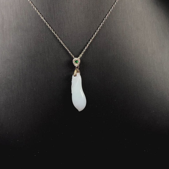 A white green smooth fortune melon naJadeite pendant.