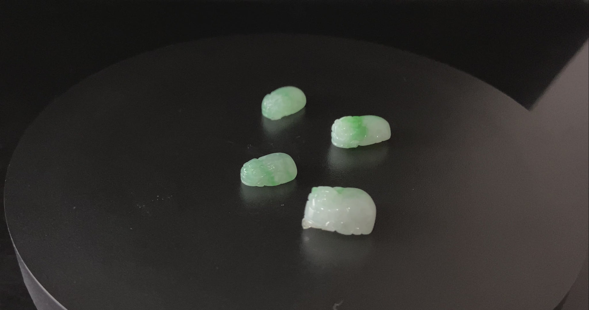 A green dot fortune Pixiu loose jadeite.