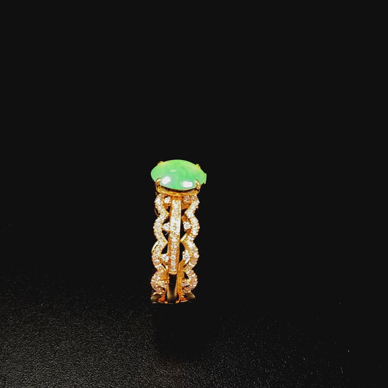 A golden wave apple hue jadeite ring.