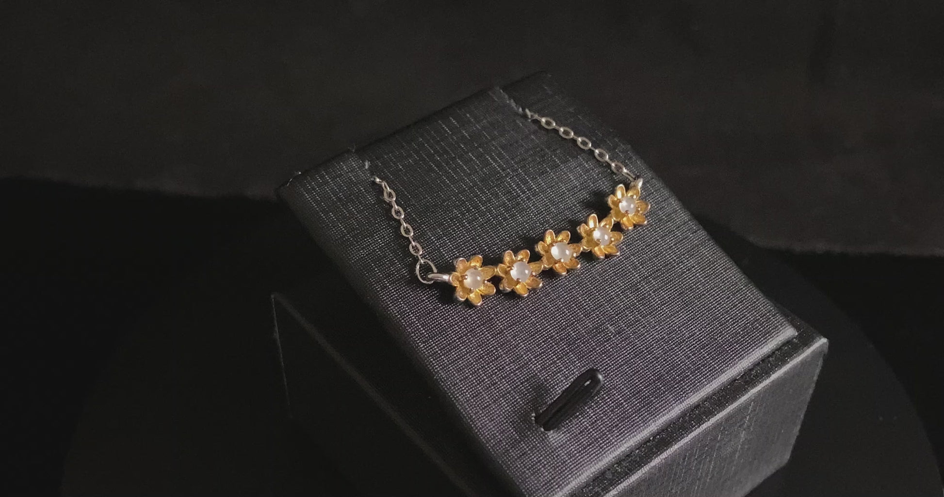 A daisy dew bloom jadeite necklace.