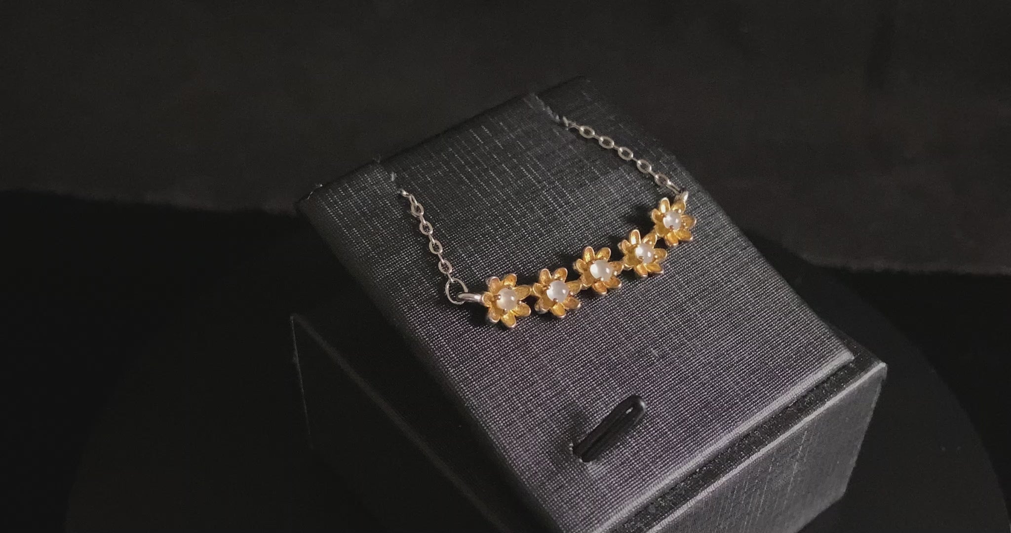 A daisy dew bloom jadeite necklace.