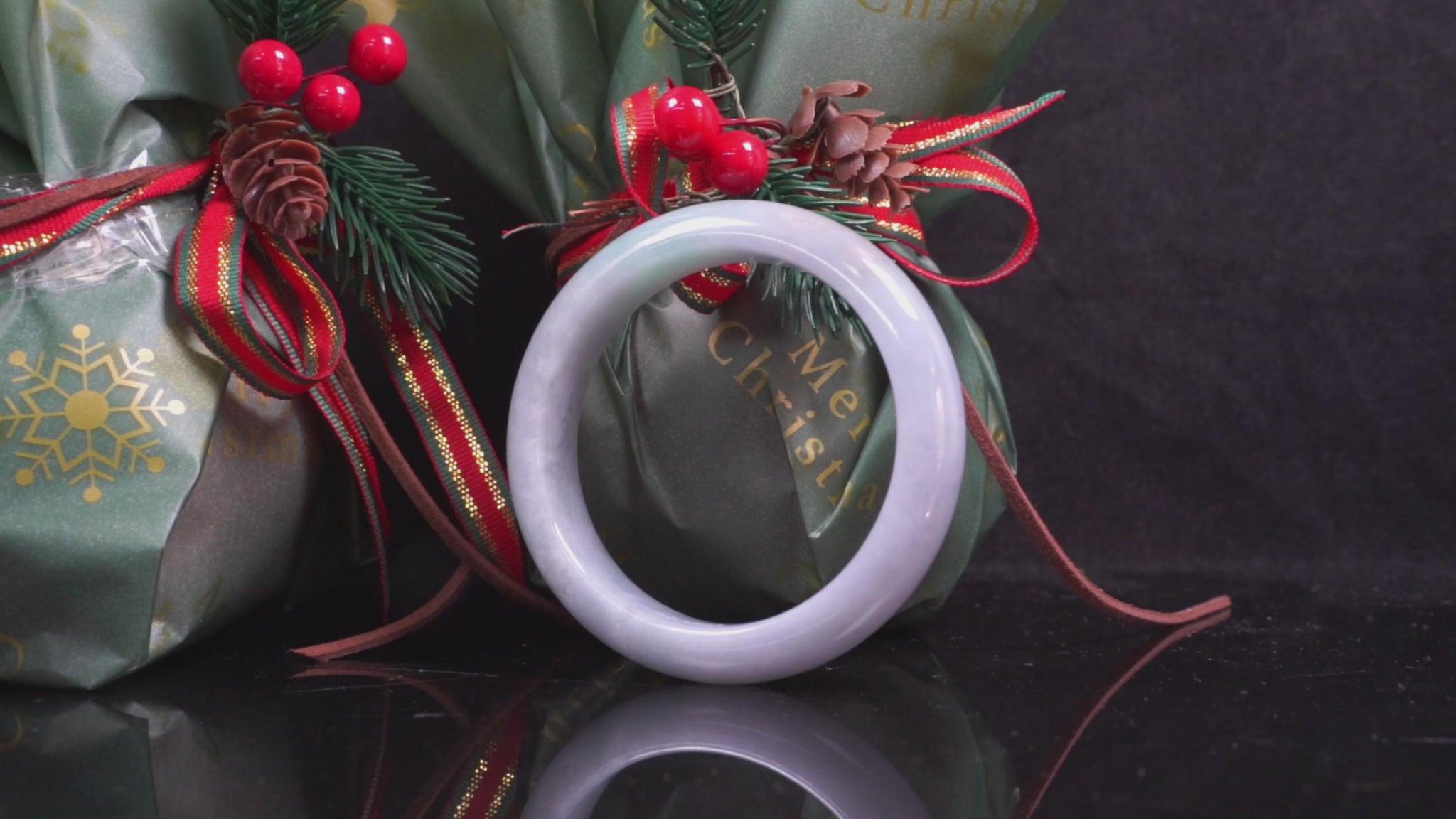 A misty green white jadeite bangle.