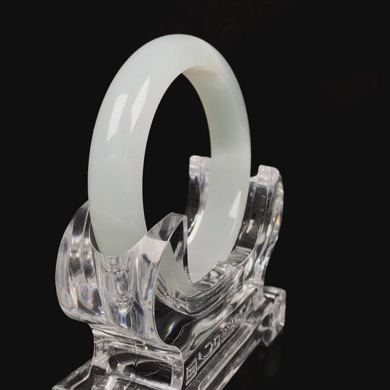 A pure milky white jadeite bangle.