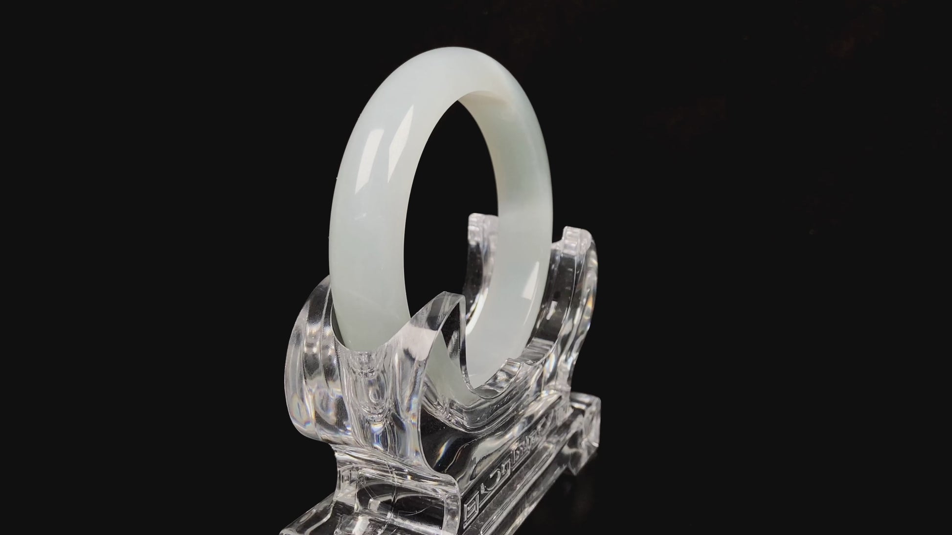 A pure milky white jadeite bangle.