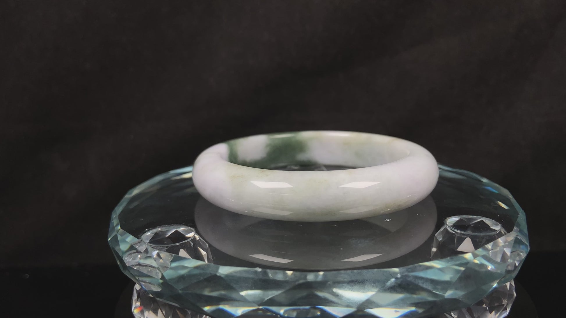 A creamy white green  jadeite bangle.