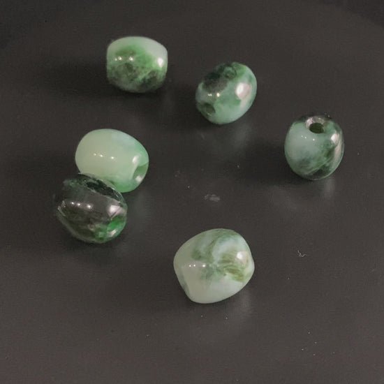 A forest dew lucky barrel loose jadeite.