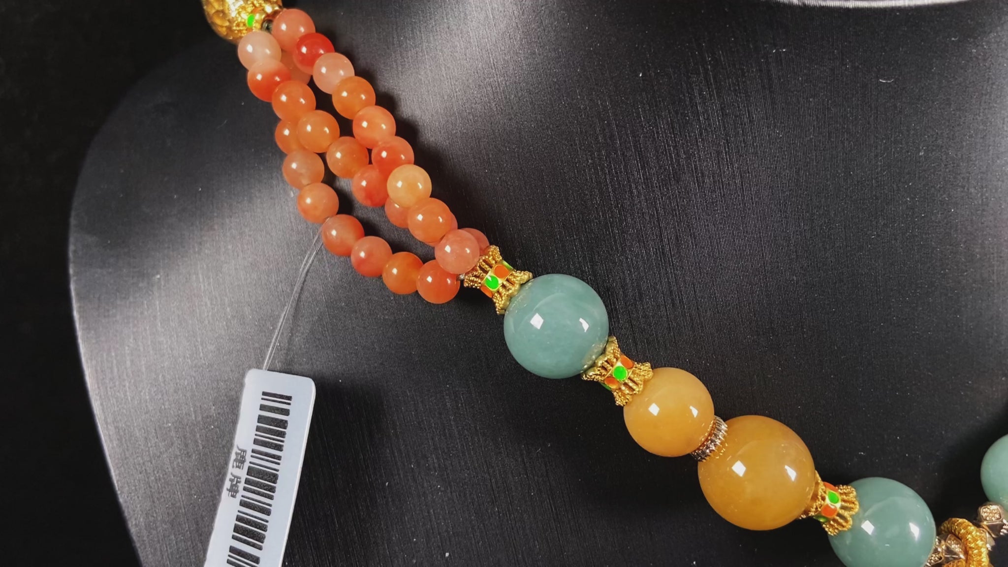 A cyan blue deer jadeite pendant.