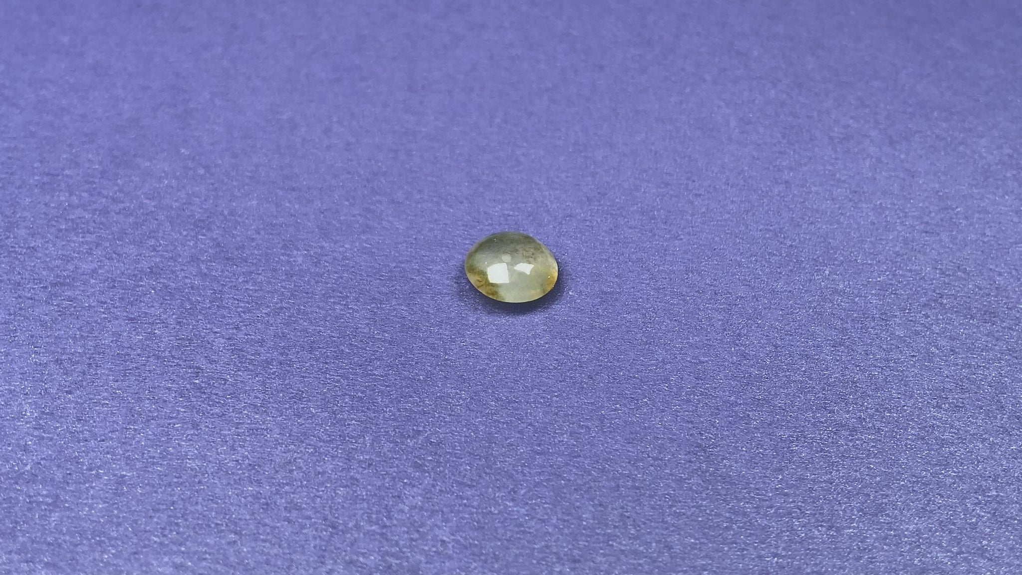 A frosted yellow icy loose jadeite.