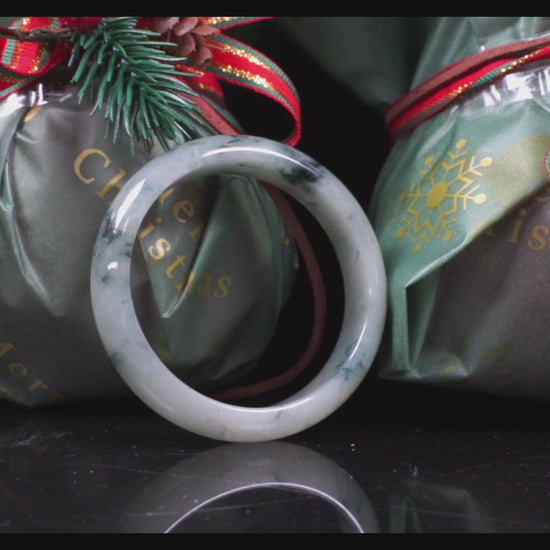 A misty teal veins jadeite bangle.