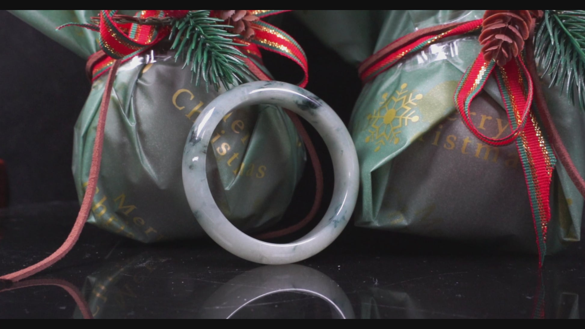 A misty teal veins jadeite bangle.