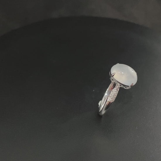 A moonlit ice cabochon jadeite ring.